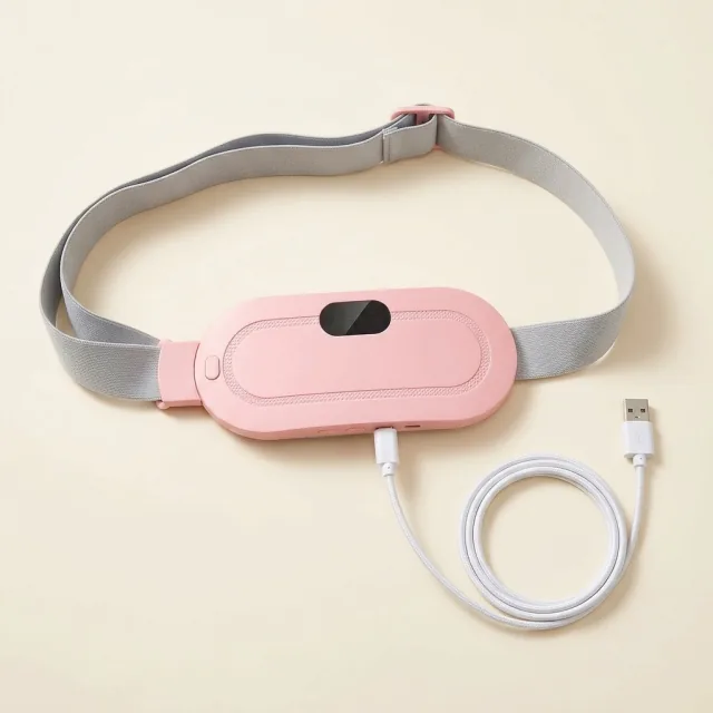 HerRelief heating belt with USB-C charging cable — real product photo